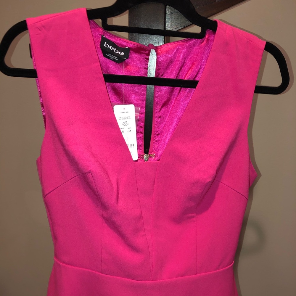 NWT PEPLUM BEBE TOP SIZE MEDIUM